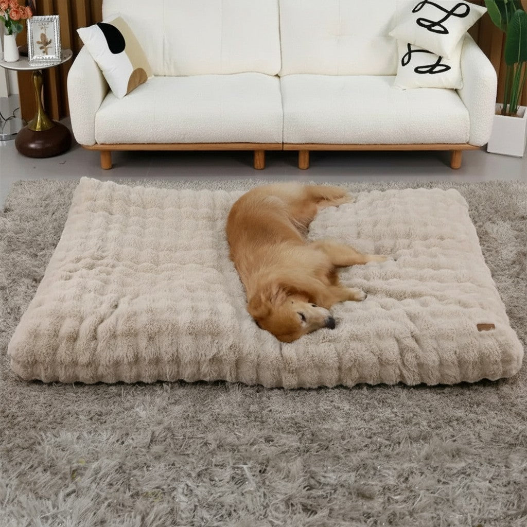 Mincy Pets beige plush dog mat with quilted texture, providing a soft, comfortable sleeping surface for a large dog.