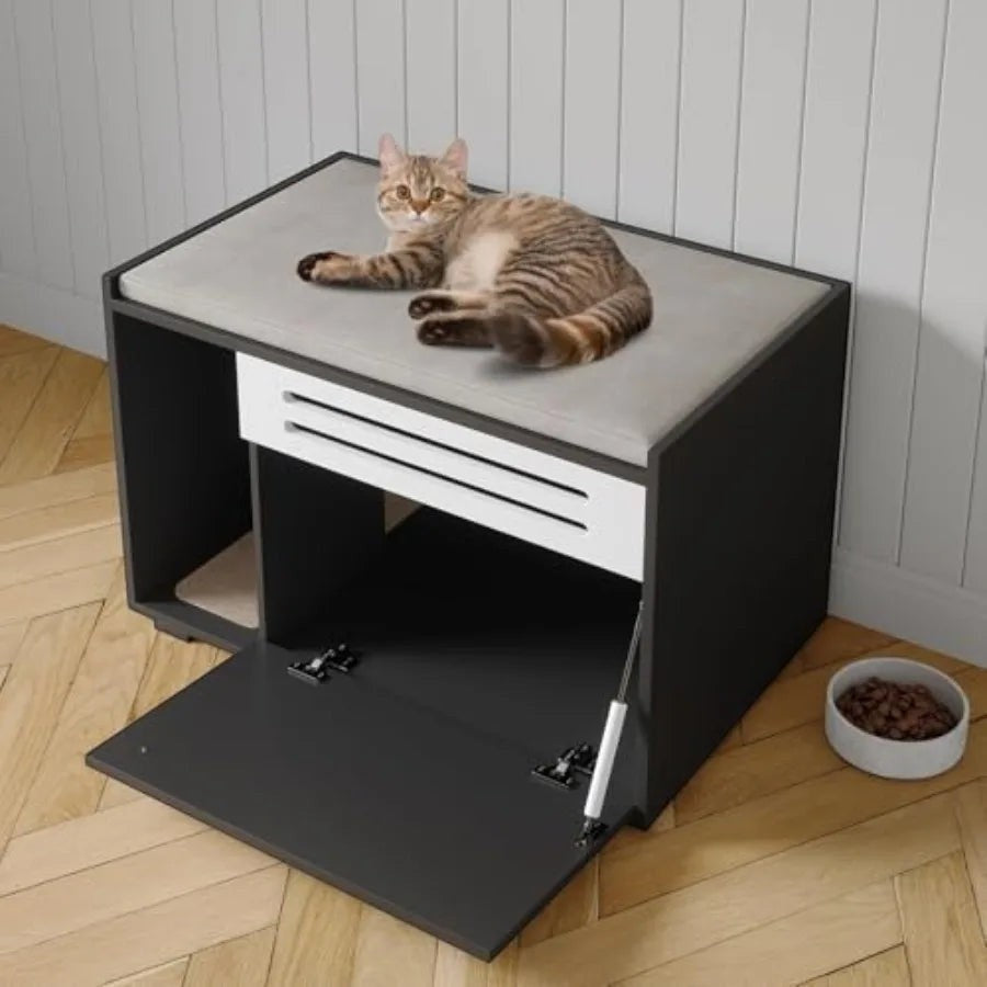 Mincy Pets cat litter box enclosure with a grey padded top, black cabinet, and white vent door, featuring a resting cat.