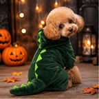 Mincy Pets Crittercozy fleece dinosaur jumpsuit on a small poodle with a green hooded tail in a fall setting.