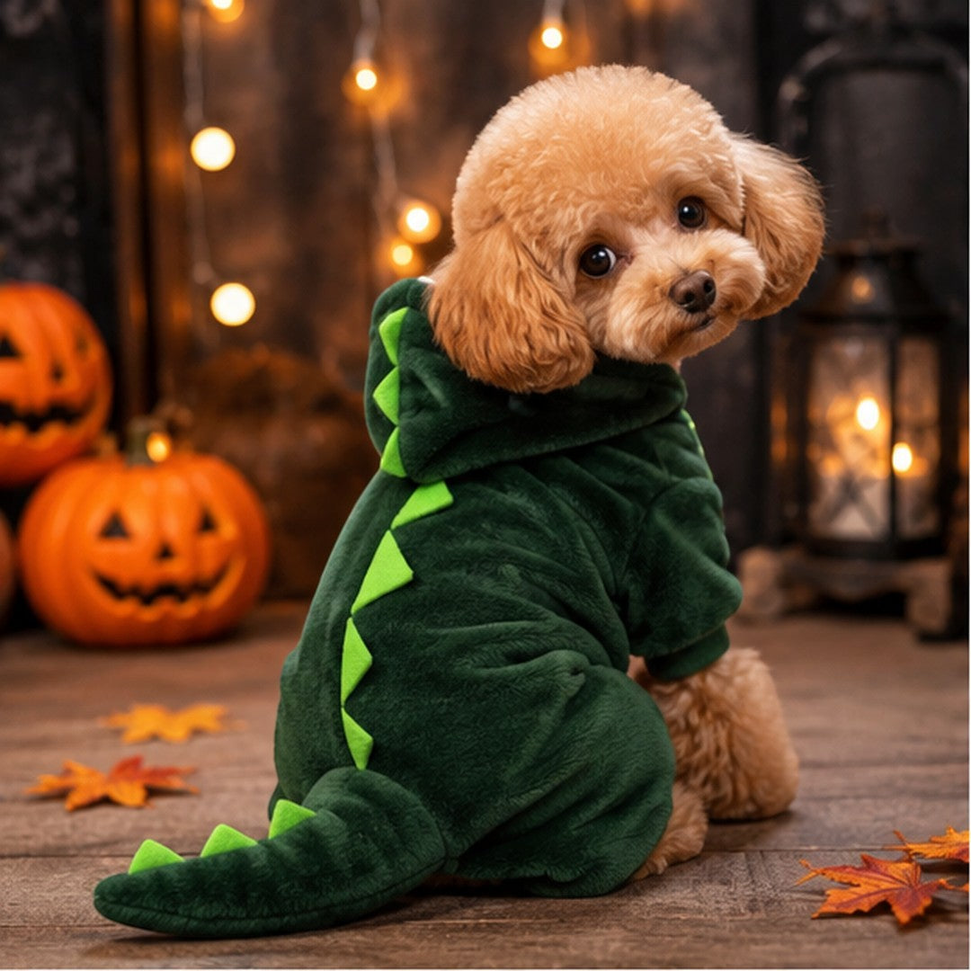Mincy Pets Crittercozy fleece dinosaur jumpsuit on a small poodle with a green hooded tail in a fall setting.
