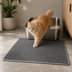 Mincy Pets ultra-large grey honeycomb cat litter mat with non-slip design placed in front of a metal litter box
