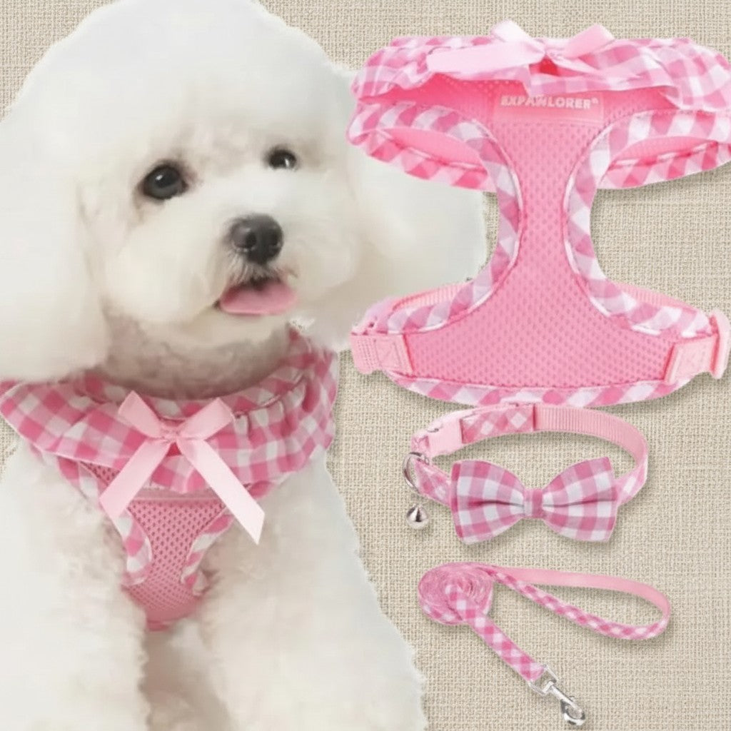 Mincy Pets pink gingham dog harness, collar with bow, and leash set worn by a white puppy