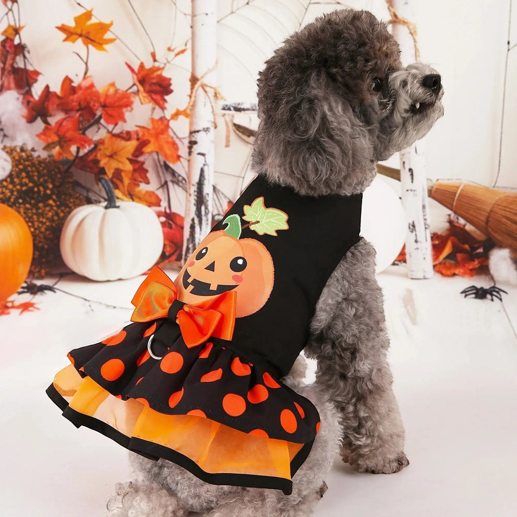 Mincy Pets dog dress featuring a pumpkin print, orange bow, and ruffled hem for Halloween in a festive setting.