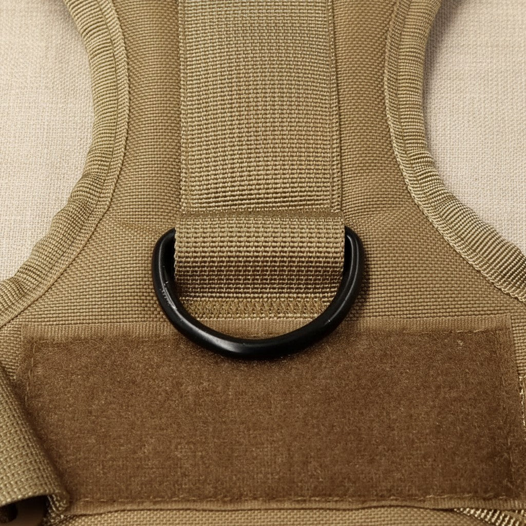 Mincy Pets tactical dog harness featuring a durable tan nylon strap, black metal D-ring, and hook-and-loop patch panel