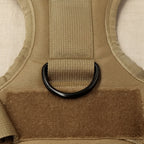 Mincy Pets tactical dog harness featuring a durable tan nylon strap, black metal D-ring, and hook-and-loop patch panel