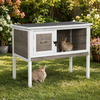 Mincy Pets elevated wooden rabbit hutch with asphalt roof and wire cage, featuring two bunnies in a garden setting.